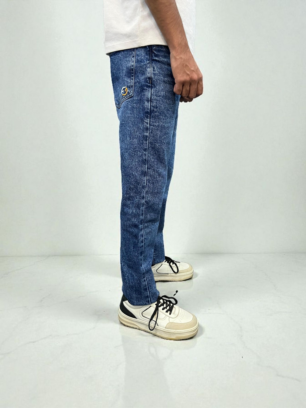 Dark indigo acid wash