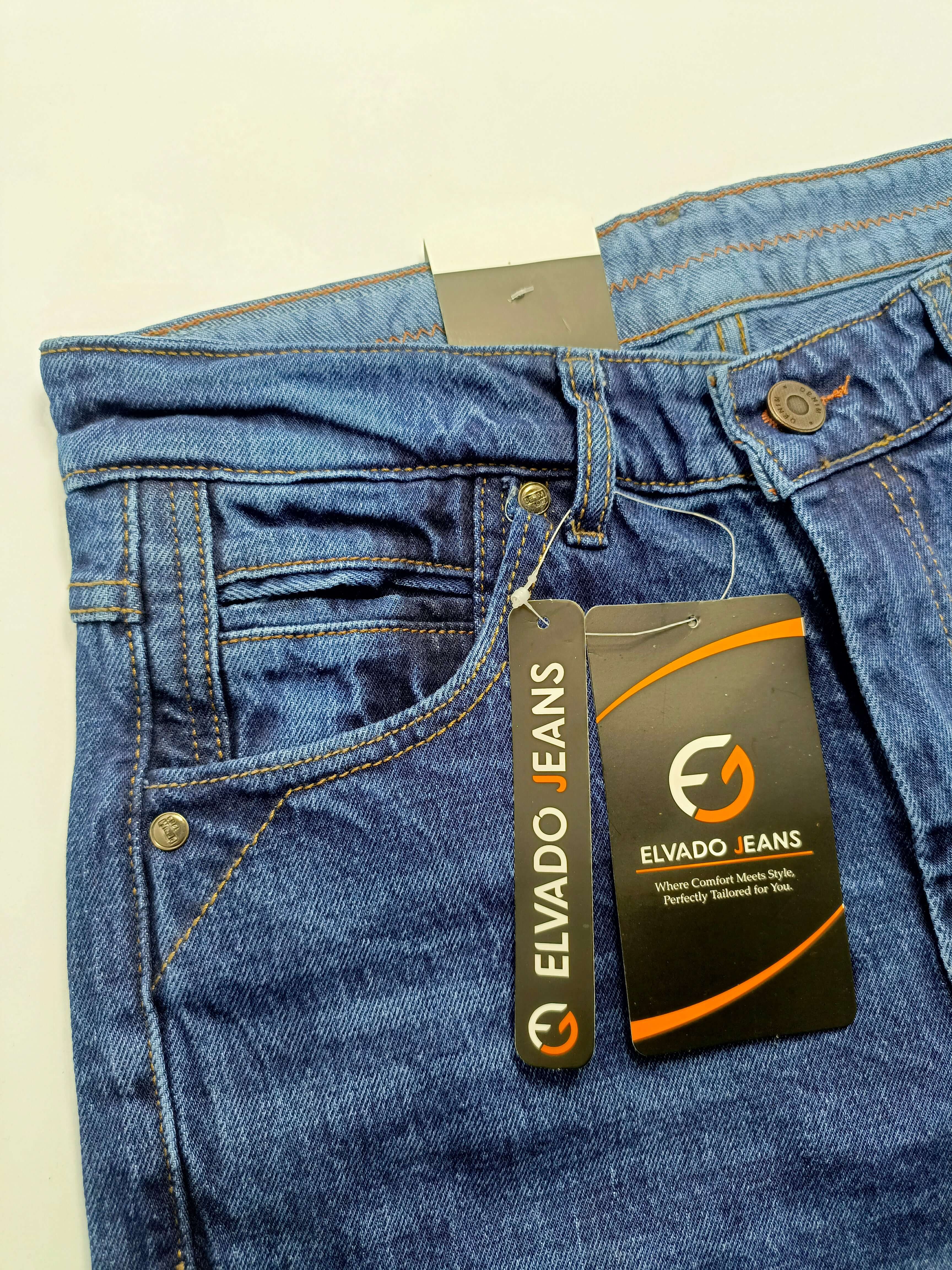 Medium Blue Denim by ELVADO JEANS featuring premium cotton jeans with a slim fit and stretchy design.