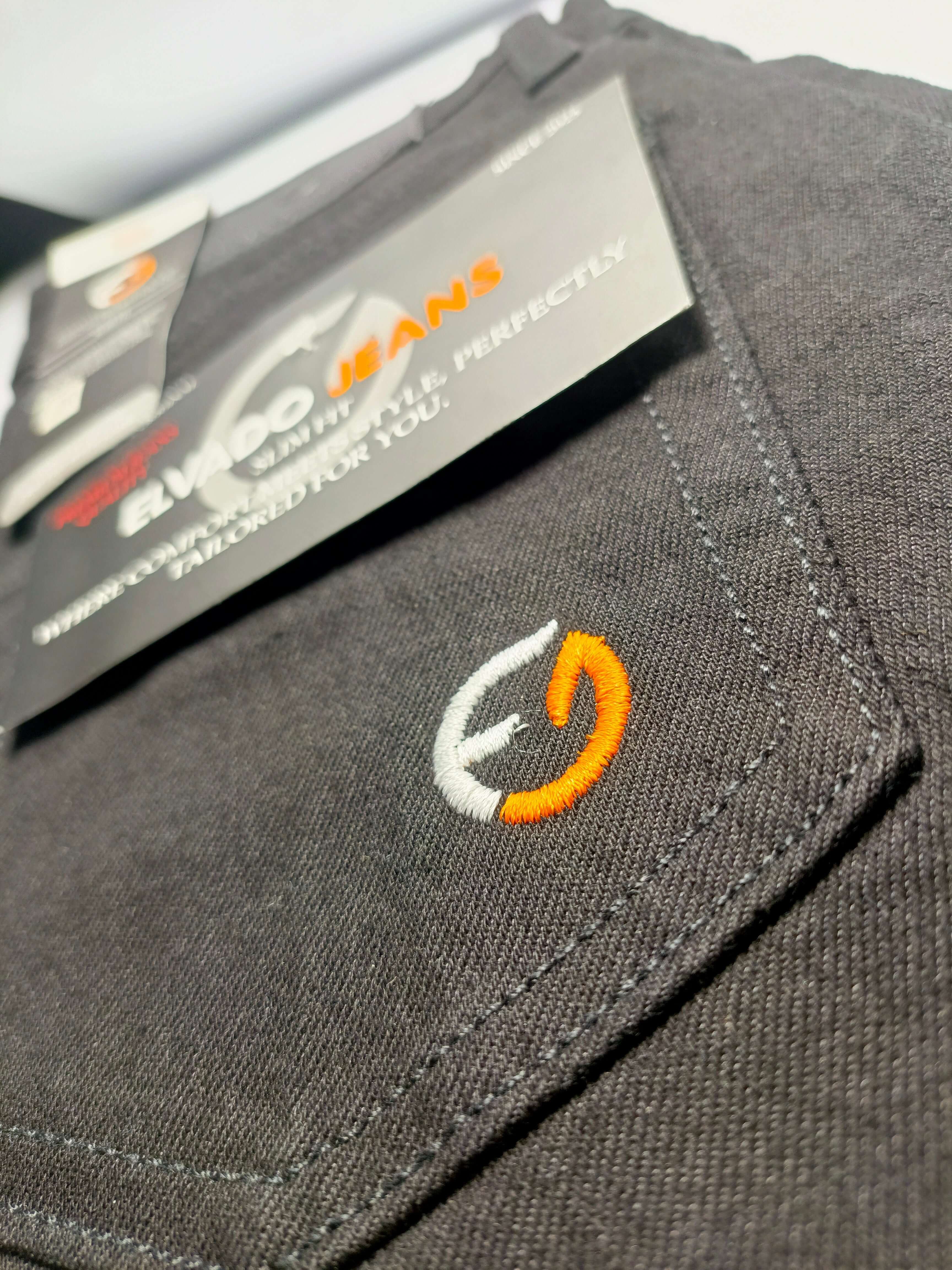 Premium Black Denim with ELVADO JEANS logo on the back pocket, showcasing quality and style in cotton jeans.
